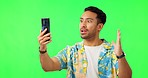 Man, video call and shock by green screen in studio with mock up space for holiday promotion. Guy, fashion and smartphone for webinar with excited face, wow and notification for mock up by backdrop