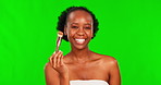 Beauty, product and recommend with a black woman on a green screen background for makeup advertising. Portrait, skincare and cosmetics with an attractive young female influencer streaming her review