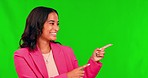 Business woman, green screen and face with hands pointing to mockup space for announcement. Studio, female person and employee portrait with a smile showing product placement and deal coming soon