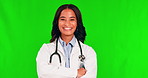 Healthcare, arms crossed and a doctor woman on a green screen background for insurance advice you can trust. Medical, smile and confident with a happy young female medicine professional on chromakey