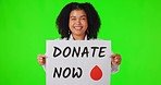 Woman, doctor and blood donation sign on green screen for wellness or support with haematologist and medical hospital for healthcare. Donor, female surgeon and on chroma key or on studio background 