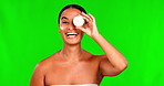 Face, cream and skincare for woman on green screen for beauty, product and healthy dermatology on studio background. Portrait, sunscreen and girl with cosmetic container, lotion and natural glow