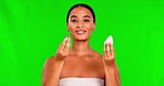 Green screen, makeup and woman with beauty blender and blush in studio on mockup background. Portrait, cosmetics and female model showing face, cheek and contour product, glamour or luxury aesthetic