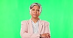 Green screen, crossed arms and senior business woman with pride, confidence and serious on studio background. Executive, chromakey and portrait of female person with mission, success and ceo career