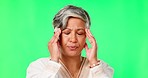 Stress, headache or mature businesswoman on green screen with burnout from job pressure or fatigue. Bad migraine problem, studio or tired senior lady depressed or frustrated by head pain or anxiety