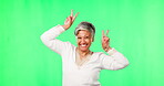 Peace sign, funny and face of woman on green screen in studio isolated on a background mockup space. Portrait, senior and person with v hand gesture for comedy, happy and excited, dancing and emoji.