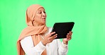 Funny, green screen and Islamic woman with a tablet, video call and laughing against a studio background. Muslim female person, mature lady and model with technology, connection and communication