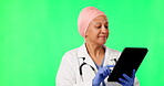 Tablet, green screen and doctor or woman isolated on studio background with yes, happy and healthcare results. Medical worker, professional or muslim person, digital tech space or telehealth mockup