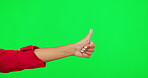 Hands, thumbs up sign and a person on green screen for support, like emoji or thank you. Hand of a woman to show icon or symbol for review, feedback or yes vote and motivation on a studio background