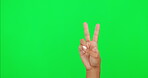 Peace, v sign and hand of a person on green screen for support, emoji or thank you. Gesture of a woman to show icon, hands or symbol for freedom, kindness or vote and motivation on studio background