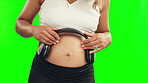 Hands, pregnant woman or headphones on belly in studio for growth or baby development. Pregnancy music, relax or mother to be streaming radio audio on stomach for healthy maternity on green screen