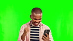 Phone, winner and man on green screen for winning, success or news of bonus, prize or achievement. Yes, fist and excited African person or online user reading, wow and mobile on a studio background