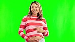 Pregnant, stomach and portrait of a happy woman on a green screen with a smile, hope and love. Excited female person laugh with hands on pregnancy belly for health and wellness on a studio background