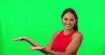 Hands, presentation and face of woman on green screen mockup for advertising product or design. Happy person, model or presenter with palm, offer or show space for information on a studio background