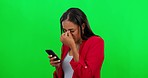 Stress, typing and woman with phone on green screen in studio with problem, spam and error mockup. Advertising, social media and frustrated female person on chromakey background with network issue