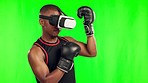 Man, boxing and virtual reality, video game and green screen with fitness, metaverse and futuristic tech on studio background. Male gamer, VR goggles and boxer with esport experience and mockup space