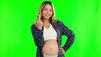 Pregnant, green screen and happy woman with middle finger in studio for conflict, hate and rude gesture. Pregnancy, maternity and portrait of female person on chromakey background with reject sign