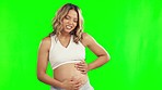 Pregnant, pain and woman with cramps on green screen in studio with anxiety, worry and stress. Pregnancy, health and female person on chromakey background with contractions, maternity strain and hurt