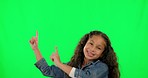 Green screen, face and hand pointing by girl child in studio for promotion, announcement or deal. Portrait, happy kid and finger sign for information, choice or decision, notification or news of sale