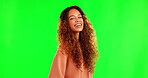 Happy, portrait and a woman laughing on green screen with curly hairstyle, happiness and funny joke. Latino person or fashion model with positive mindset, smile and beauty on a studio background