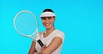 Face, tennis and happy woman with arms crossed in studio isolated on a blue background mockup. Portrait, racket sports and confident athlete from Brazil ready to start exercise, training or fitness.