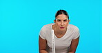 Face, tennis and serious woman with racket for fitness in studio isolated on a blue background mockup. Portrait, racquet sports and athlete from Brazil ready to start exercise, training or workout.