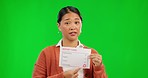 Report card, face and woman on green screen presentation for fail, mistake or confused for education feedback. School, university student or person show bad results or problem on a studio background