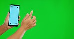 closeup, hand and smartphone with green screen, typing and tracking markers against a studio background. Person, model and hands with cellphone, contact and social media with connection and network