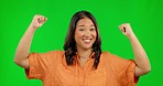 Face, woman and flex muscle on green screen in studio isolated on a background. Portrait, strong arms and Asian person with power, empowerment and pride for strength, gender equality and funny laugh.