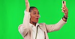 Green screen, woman and dance with music, headphones and phone, happy and fun on mockup background. Radio, earphones and female dancing to podcast on smartphone app, smile and celebrating freedom