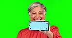 Phone, mockup and hand of a woman on green screen for announcement, advertising or website. Happy mature person with smartphone and tracking markers for ui marketing, internet or network promotion