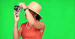 Woman, green screen and photographer on vacation, holiday or tourist with camera for travel, memory and photography of adventure. Film, photo and person on tour, journey and happiness on summer trip