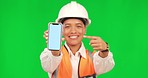 Architect woman, phone and point by green screen with smile on face for logo, app or thumbs up in mockup. Female engineer, architecture or sign for choice, review or vote in real estate construction