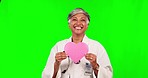 Doctor, woman and heart sign by green screen with face, smile and happy for healthcare job in mockup. Senior medic, cardiology expert and excited with icon, emoji and experience with medical wellness