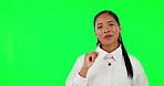 Marketing, woman with hand gesture for promotion and against a green screen with a smile. Advertising or announcement, mockup space or good news and female person pose for presentation in chroma key