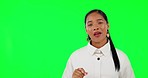 Advertising, woman with hand gesture for promotion and against a green screen with a smile. Marketing or presentation, mockup space or good news and female person pose for announcement in chroma key