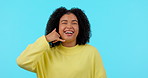 Woman, portrait and hand sign for phone call, contact us or conversation on telephone in blue background for crm mockup. Girl, studio and gesture for cellphone, connection and networking mock up