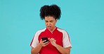 Stress, phone and soccer woman in studio with bad connection, news or glitch on blue background. Anxiety, mistake and female football player frustrated with 404, internet or delay, signal or error