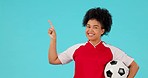 Soccer, woman portrait and hand point for bullet list and sports information in studio. Blue background, female athlete and smile for advertisement decision and promo for training and exercise choice