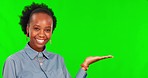 Palm presentation, face and black woman on green screen in studio isolated on a background. Portrait, mockup hand and happy person with advertising space, marketing or promotion for product placement