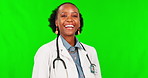 Smile, laughter and a doctor black woman on a green screen background in studio for healthcare treatment. Humor, funny or comedy with a happy female medicine professional on chromakey mockup