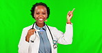 Pointing, healthcare and black woman with a pregnancy test on a green screen for a choice. Decision, portrait and African doctor with pregnant results and gesture isolated on mockup studio background
