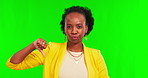 Thumbs down, feedback and reject with a black woman on a green screen background in studio to dislike. Portrait, face and emoji with a young female person showing a negative hand gesture on chromakey