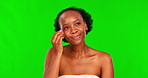 Green screen makeup sponge, happy face and black woman application of foundation, spa cosmetics or facial collagen. Chroma key product, beauty skincare glow or female model smile on studio background
