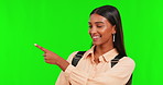 Green screen, happy girl or portrait of student pointing school scholarship or university choice on mockup. Face, 3 or pupil with smile showing college education, option or study info on studio space