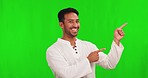 Asian man, tai chi and pointing on green screen for advertising healthy exercise against a studio background. Portrait of calm male person in motion meditation show for marketing on mockup space
