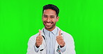 Thumbs up, green screen and man doctor with thank you sign pointing isolated in a studio background and happy. Agreement, medical and man professional or healthcare worker accept, yes and success