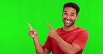 Man, pointing and presentation on green screen for marketing space, announcement or information, Yes, offer and happy face of asian person show mock up, creative design or guide on studio background