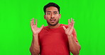 Shocked, scared and face of man on green screen for fear, horror and announcement. Surprise, alert and notification with portrait of person on studio background for drama, danger and scary mockup