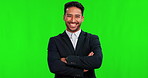 Business man, portrait and smile on green screen for confidence, happy mindset and pride. Professional asian person with arms crossed in corporate clothes for career or growth on studio background 
